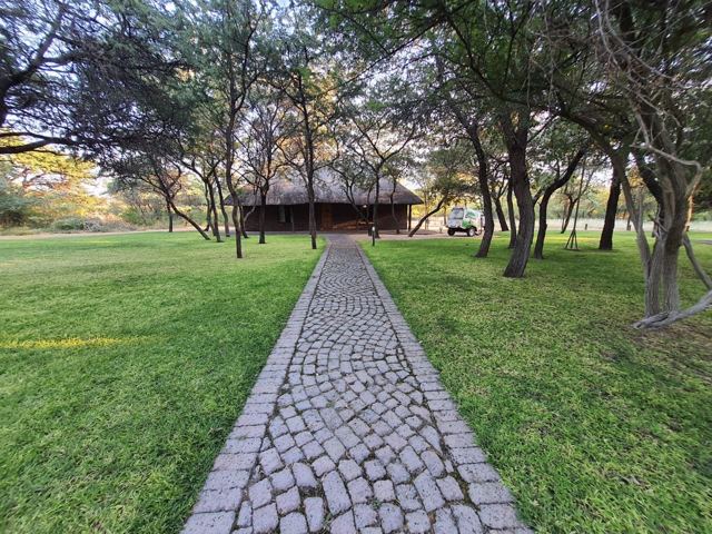 Estate lawn with cobbled walkway